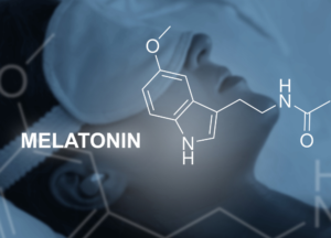 Melatonin molecular structure over a sleeping person demonstrating how melatonin supports circadian rhythm, healthy sleep patterns and nighttime recovery